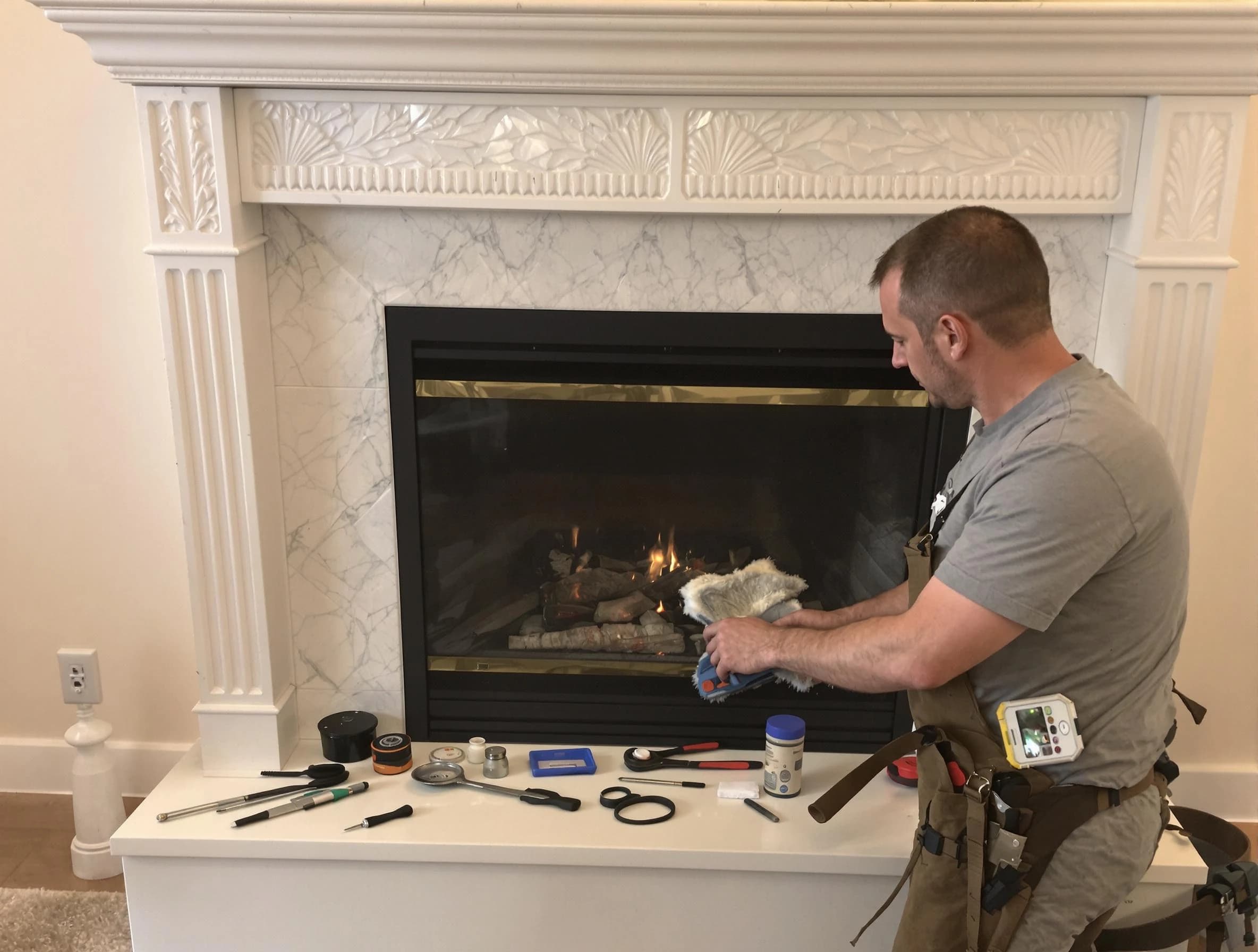 Norman Chimney Sweep performing fireplace maintenance in Norman, OK